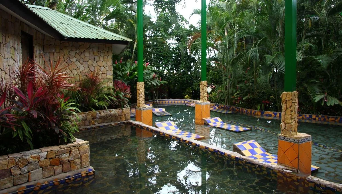 Baldi hot springs resort pools in La Fortuna Costa Rica photographed among tropical trees